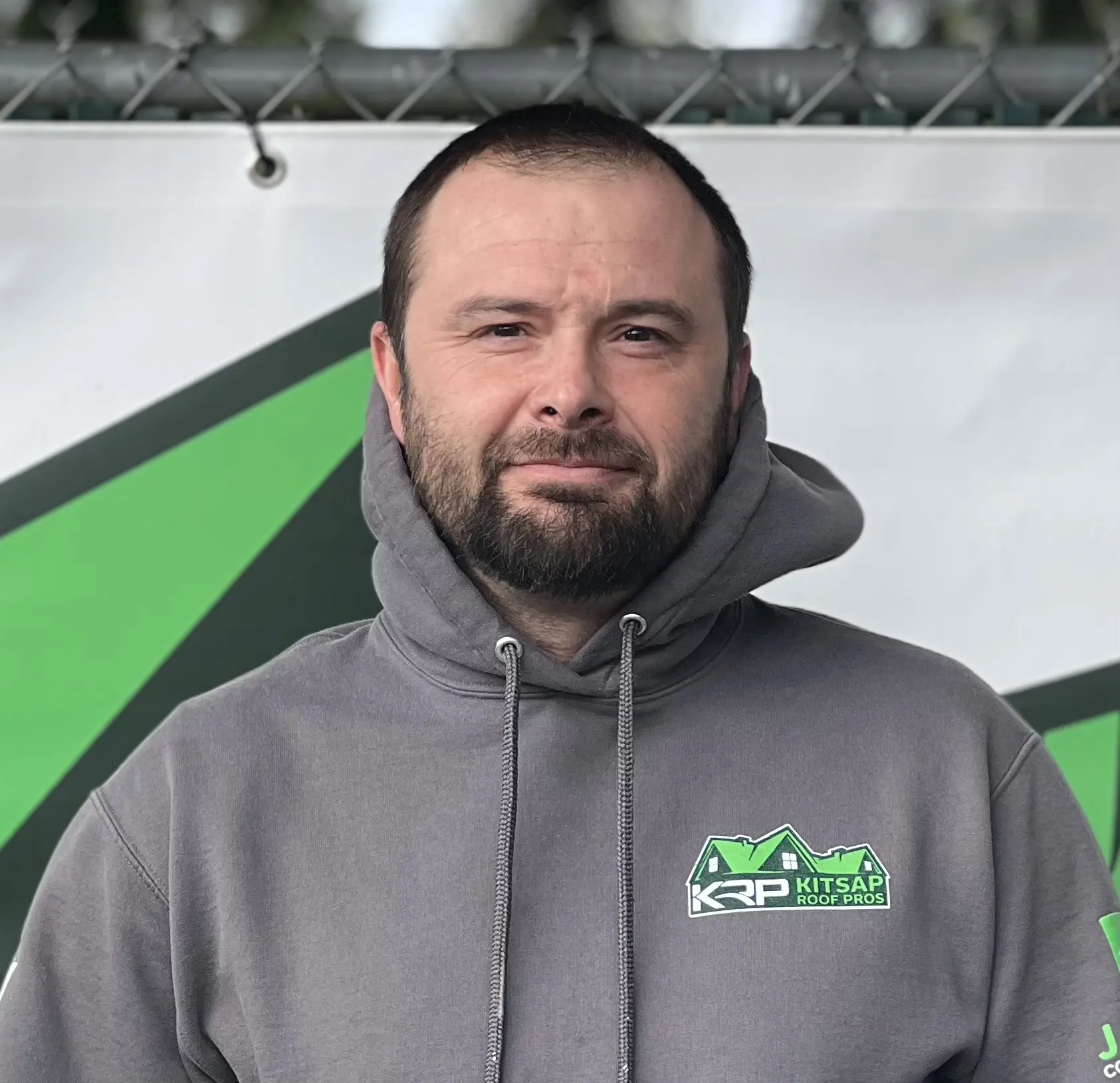 headshot of kitsap employee, brad woods, wearing kitsap hoodie